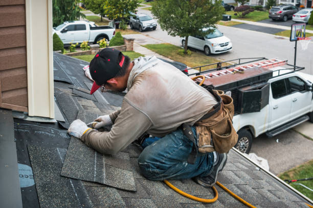 Professional Emergency Roof Repair technician working in Brookhaven, NY